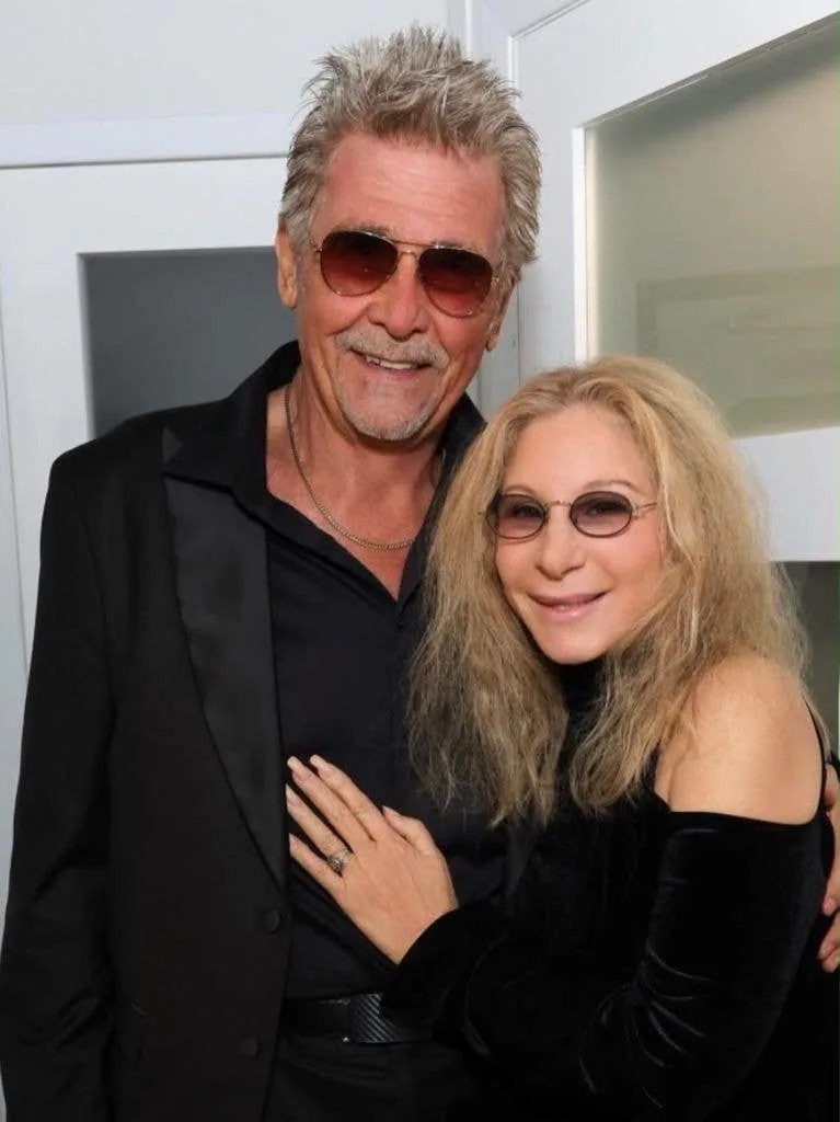 photo of Barbra Streisand and husband James Brolin smiling