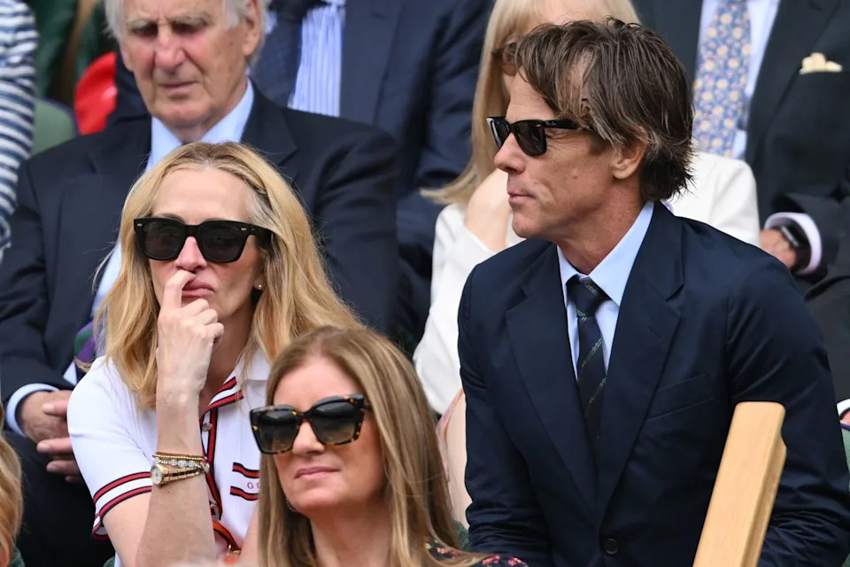 Julia Roberts and Daniel Moder sit courtside during the Wimbledon Tennis ChampionshipsCredit: Getty