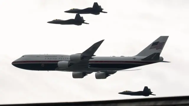F22 Raptor fighter jets escort di new version of Air Force One as dem fly ova di National Mall during di Salute to America Semiquincentennial celebration in Washington