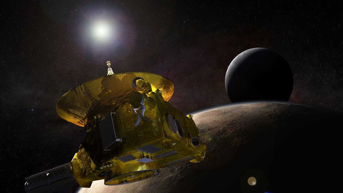 Pluto flyby mission wakes up after long sleep nearly 6 billion miles from Earth
