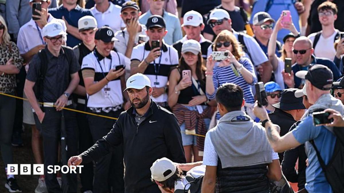 Scottie Scheffler walking past spectators during the 2025 Open Championship at Royal Portrush