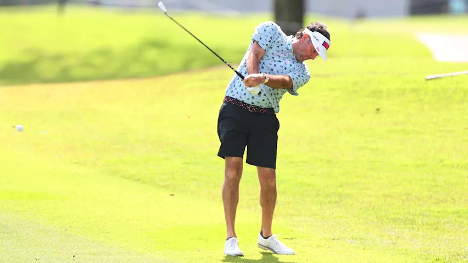 Bubba Watson hits a utility iron