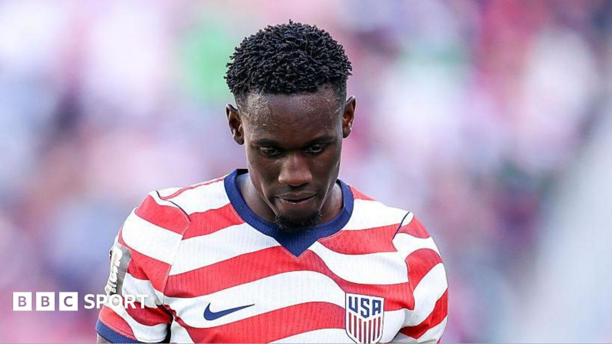 Jarell Quansah walks off the pitch after being sent off during the World Cup 2026 match between Mexico and England