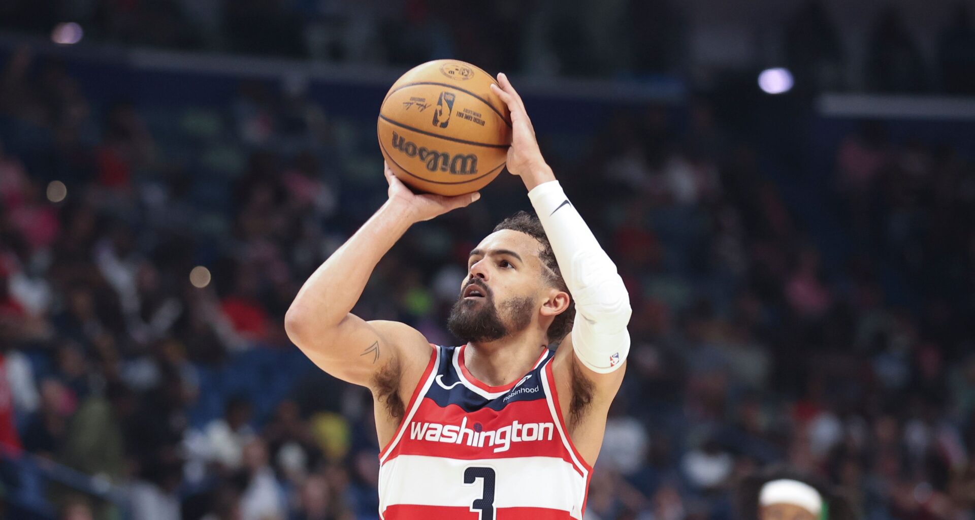 FILE - Washington Wizards guard Trae Young attempts a technical foul free throw against the New Orleans Pelicans in the second half of an NBA basketball game in New Orleans, March 8, 2026. (AP Photo/Peter Forest, File)