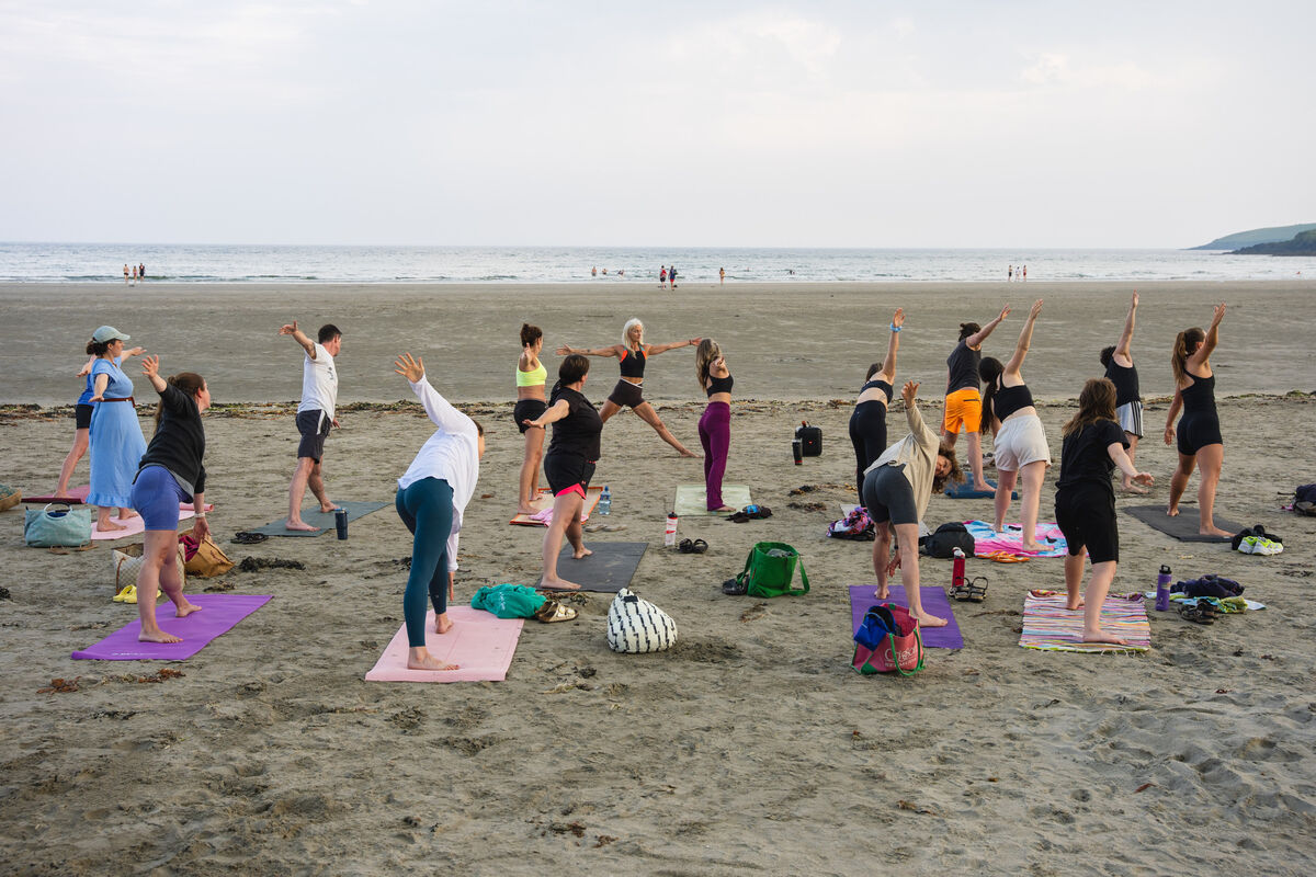 Odette Norman leading a yoga class on Inchydoney beach in West Cork. Picture by Noel Sweeney