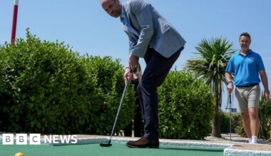 Prince William plays crazy golf after fishing trip - BBC