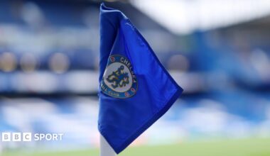 A corner flag with the Chelsea crest on