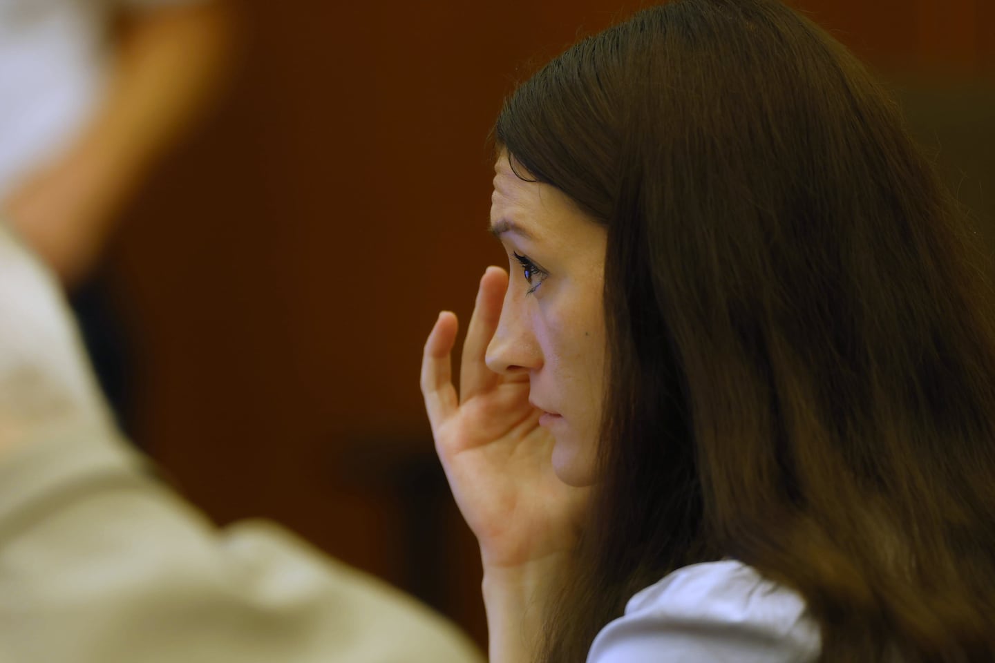Defendant Lindsay Clancy listens during her murder trial at Plymouth Superior Court in Plymouth.