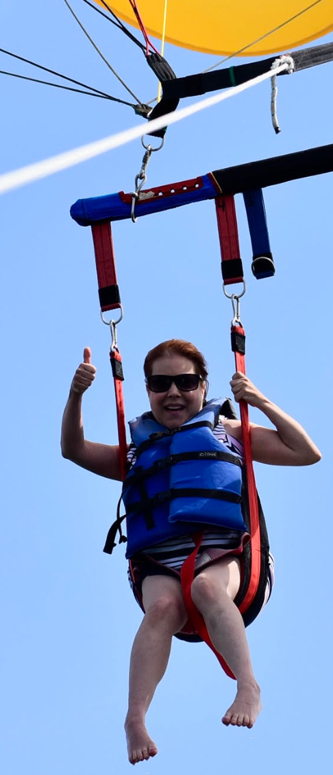 The author parasailing in Key Largo Bay, Florida, in 2018.