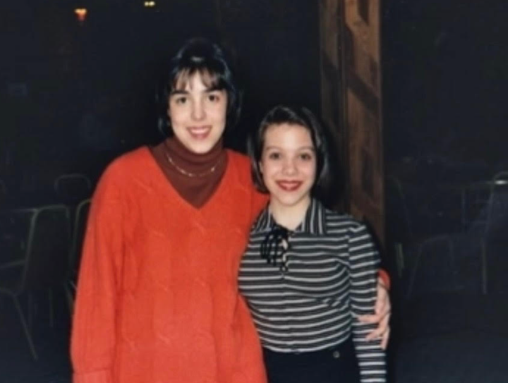 The author (right) with her sister Michelle. "This was at my high school graduation party in 1996," the author writes. "I was 18 and Michelle was 21."