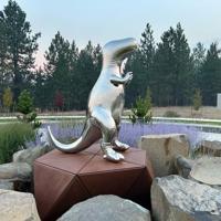 Stolen T.rex statue returned home to Mead roundabout | News