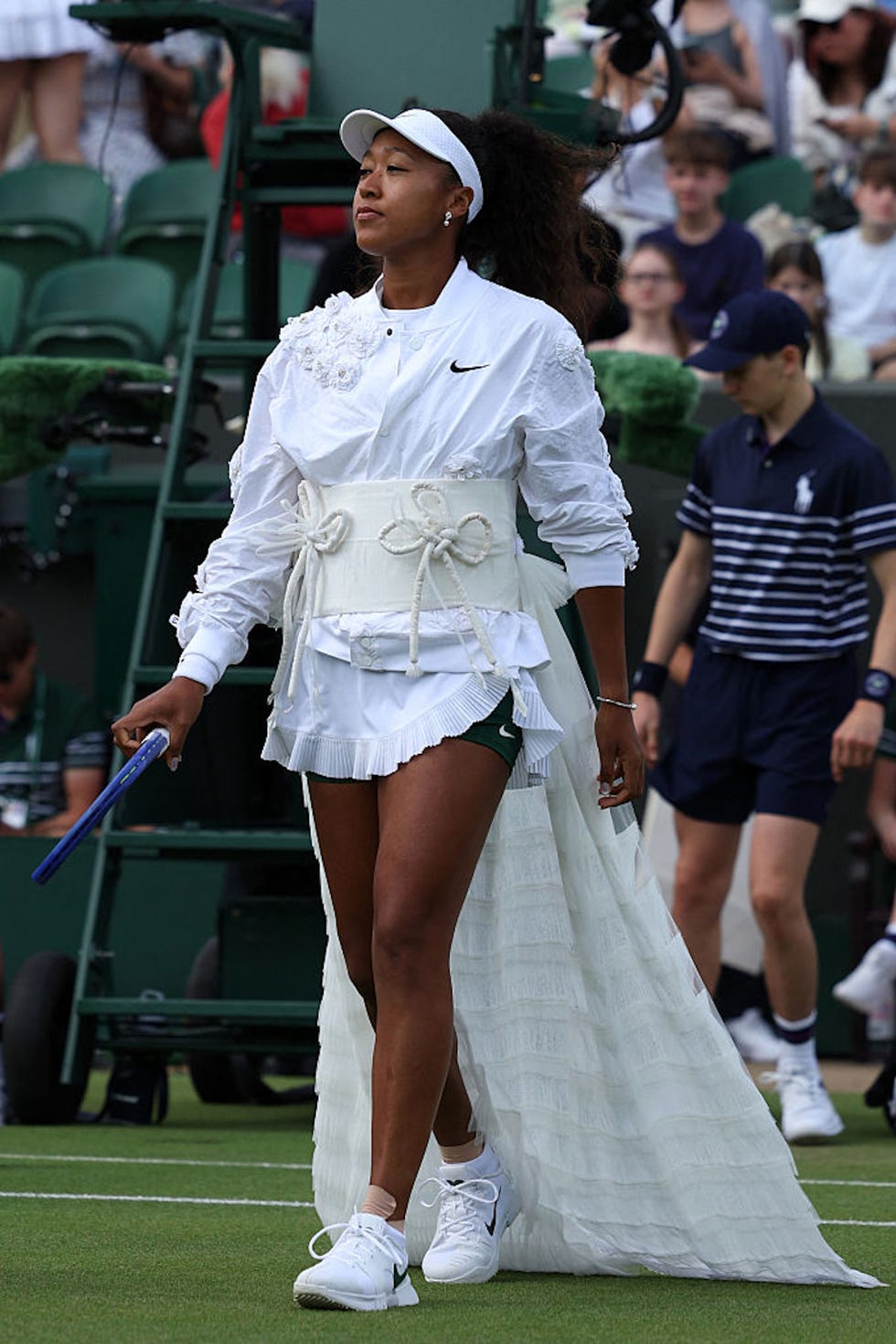 japan's naomi osaka arrives before her women's singles second round tennis match on the third day of the 2026 wimbledon championships at the all england lawn tennis and croquet club in wimbledon, southwest london, on july 1, 2026 photo by adrian dennis  afp  restricted to editorial use