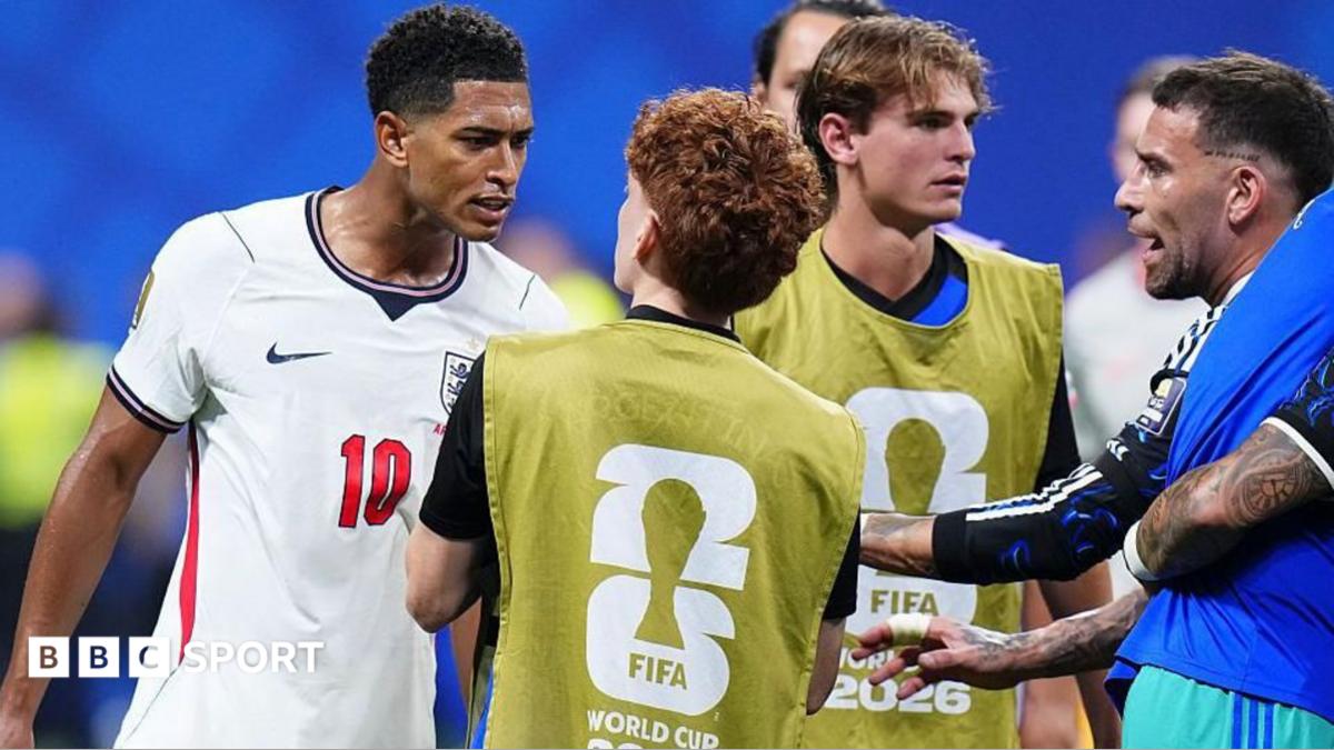 Jude Bellingham of England confronts Valentin Barco of Argentina at the World Cup semi-final between England and Argentina at Atlanta Stadium