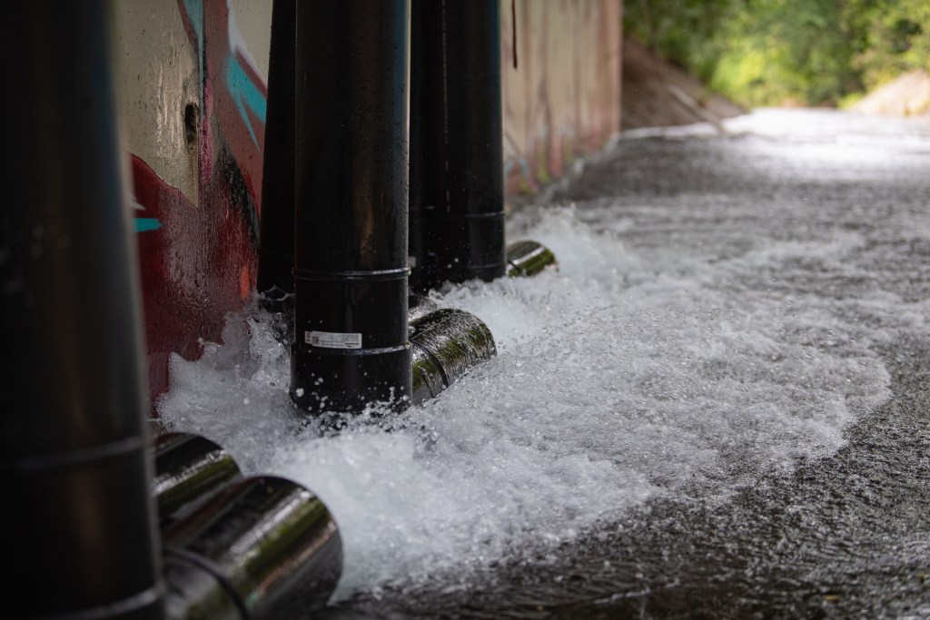 AIEA, Hawaii (Jan. 31, 2022) – Up to 3,500 gallons of water from the Red Hill Well is discharged into Halawa Stream after passing through a series of granular activated carbon (GAC) filters.  The Interagency Drinking Water System Team is a joint initiative where the U.S. Navy is working closely with the Hawaii Department of Health, U.S. Environmental Protection Agency and the U.S. Army to restore safe drinking water to Joint Base Pearl Harbor-Hickam housing communities through sampling and flushing. For detailed information, go to: www.navy.mil/jointbasewater. (U.S. Navy photo by Mass Communication Specialist Seaman Christopher Thomas)