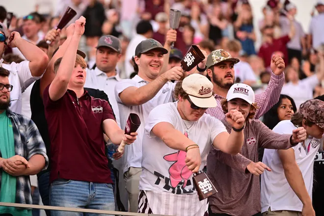 Oct 19, 2024; Starkville, Mississippi, USA; Mississippi State Bulldogs fans cheer during the fourth quarter against the Texas A&M Aggies at Davis Wade Stadium at Scott Field. Mandatory Credit: Matt Bush-Imagn Images
