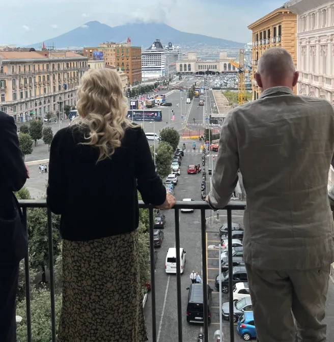 Trudie and Sting taking in panoramic views across the city towards Mount Vesuvius