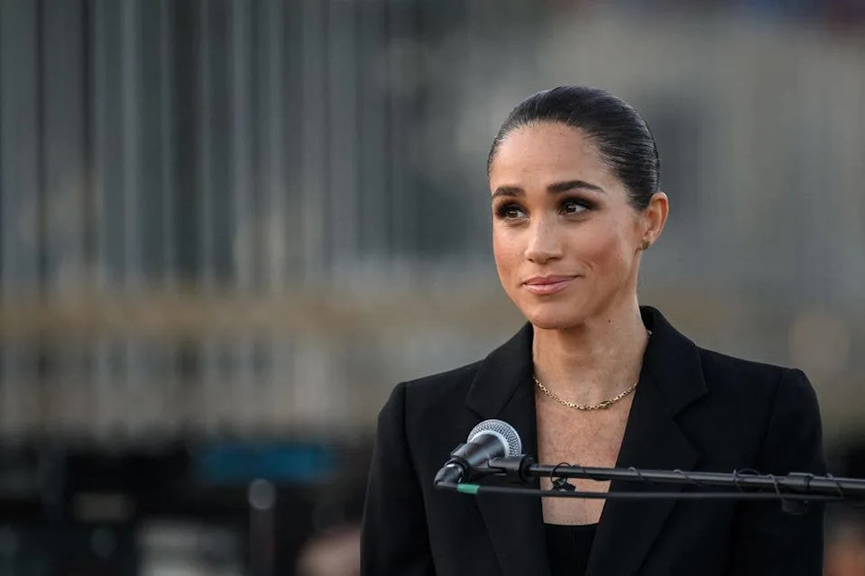 Britain's Meghan, the Duchess of Sussex delivers a speech at the opening of the "Lost Screen Memorial", an art installation of giant illuminated smartphones representing 50 children who tragically lost their lives following harm linked to social media, displayed at Place des Nations, ahead of the 79th World Health Assembly in Geneva, on May 17, 2026.