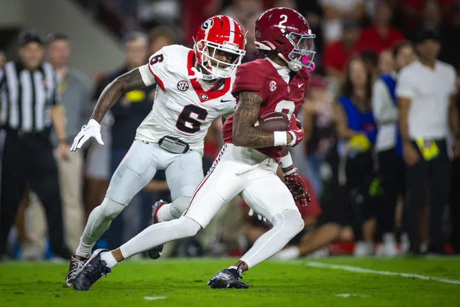 Sep 28, 2024; Tuscaloosa, Alabama, USA; Georgia Bulldogs defensive back Daylen Everette (6) pursues Alabama Crimson Tide wide receiver Ryan Williams (2) during the first quarter at Bryant-Denny Stadium. Will McLelland-Imagn Images