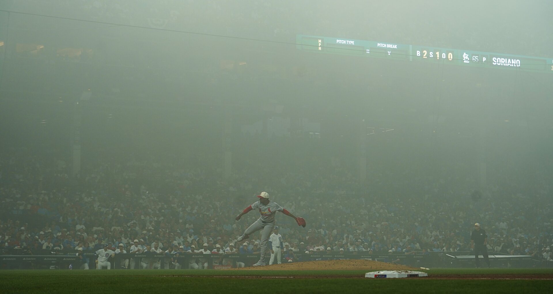 St. Louis Cardinals pitcher Kyle Leahy throws the ball in the fog against the Chicago Cubs during the sixth inning of a baseball game Saturday, July 4, 2026, in Chicago. (AP Photo/David Banks)