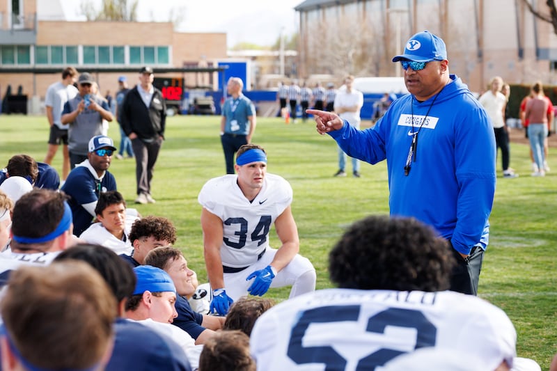 BYU head coach Kalani Sitake talks to his team during spring camp in Provo on March 27, 2026.