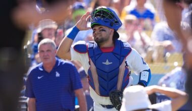 Los Angeles Dodgers catcher Eliezer Alfonzo looks toward the sky as he takes the field prior to a baseball game against the San Diego Padres, Sunday, July 5, 2026, in Los Angeles. (AP Photo/Mark J. Terrill)
