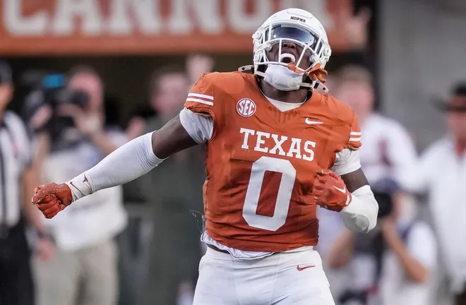 Texas Longhorns linebacker Anthony Hill Jr. (0) celebrates