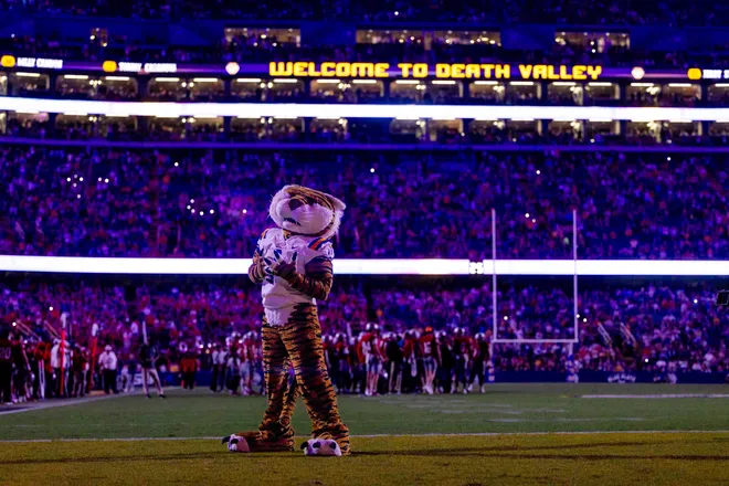 Sep 7, 2024; Baton Rouge, Louisiana, USA; LSU Tigers mascot Mike the Tiger performs for fans during a time out against the Nicholls State Colonels during the second half at Tiger Stadium. Mandatory Credit: Stephen Lew-Imagn Images