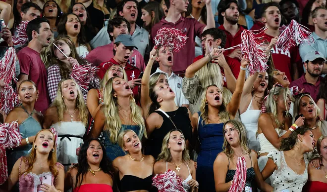 Sep 28, 2024; Tuscaloosa, Alabama, USA; Alabama Crimson Tide fans sing during the third quarter against the Georgia Bulldogs at Bryant-Denny Stadium. Mandatory Credit: John David Mercer-Imagn Images