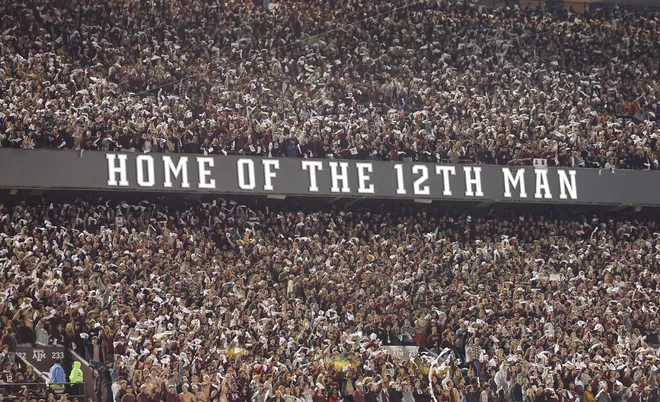 Nov 30, 2024; College Station, Texas, USA; Fans cheer during the game between the Texas A&M Aggies and the Texas Longhorns at Kyle Field. Mandatory Credit: Troy Taormina-Imagn Images