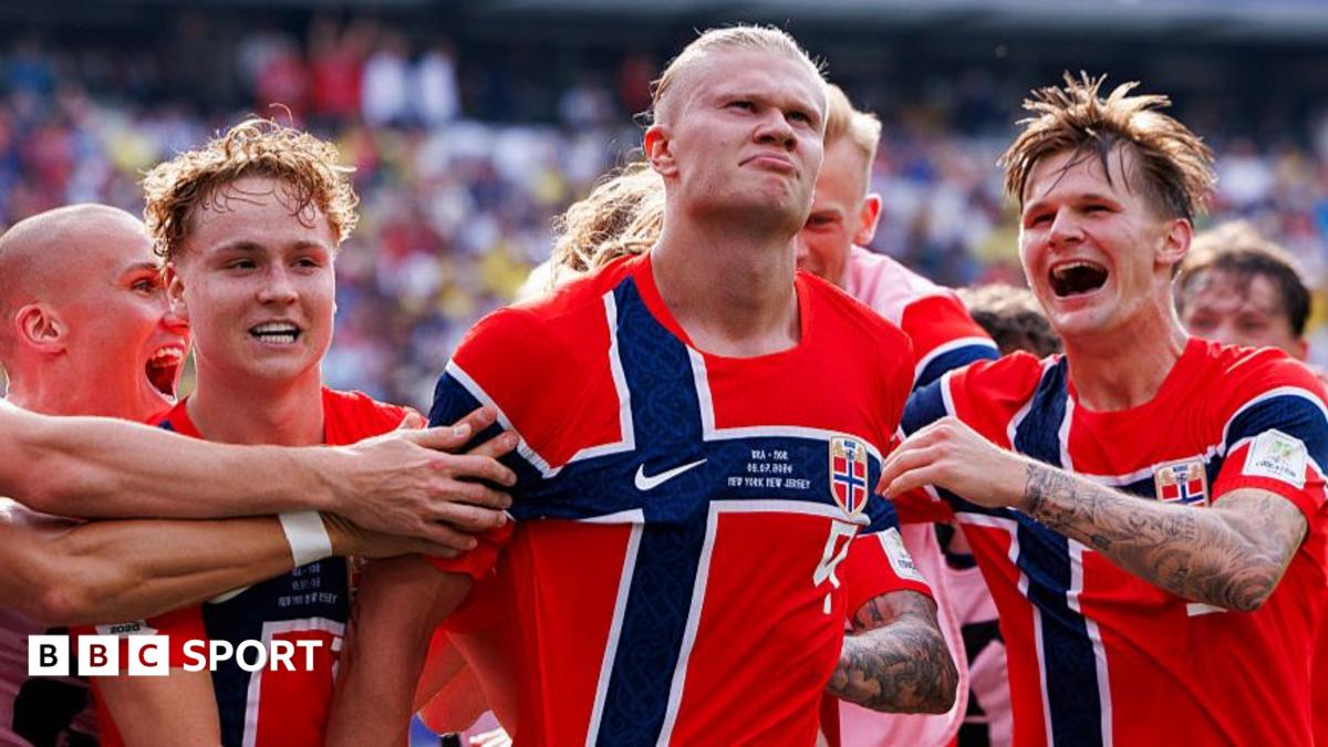 Erling Haaland leads the Norway team in the 'Viking row' celebration following their 2-1 victory over Brazil.