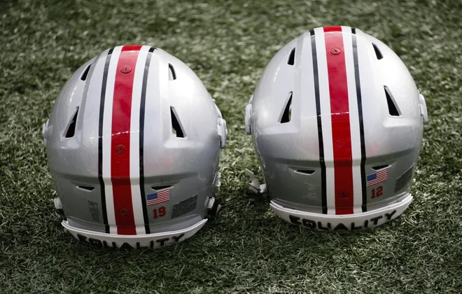 Ohio State Buckeyes helmets with the work “Equality†sit on the sidelines before a NCAA Division I football game between the Ohio State Buckeyes and the Nebraska Cornhuskers on Saturday, Oct. 24, 2020 at Ohio Stadium in Columbus, Ohio.
Cfb Nebraska Cornhuskers At Ohio State Buckeyes