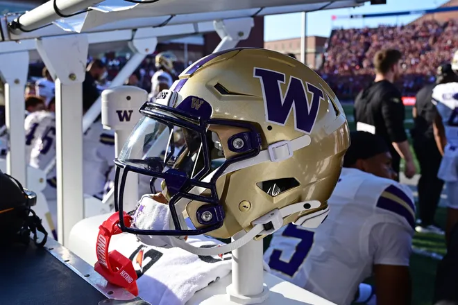 Sep 20, 2025; Pullman, Washington, USA; Washington Huskies helmet sits during a game against the Washington State Cougars in the first half of Apple Cup at Gesa Field at Martin Stadium. Mandatory Credit: James Snook-Imagn Images