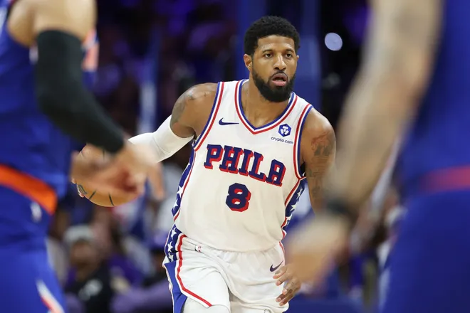 May 8, 2026; Philadelphia, Pennsylvania, USA; Philadelphia 76ers forward Paul George (8) controls the ball against the New York Knicks during the fourth quarter of game three of the second round of the 2026 NBA Playoffs at Xfinity Mobile Arena. Mandatory Credit: Bill Streicher-Imagn Images