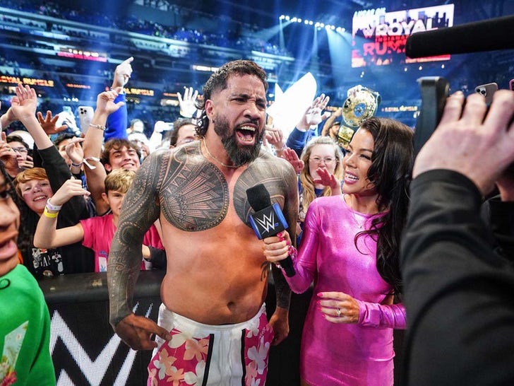 Jey Uso celebrates in the crowd with fans after his Rumble win!