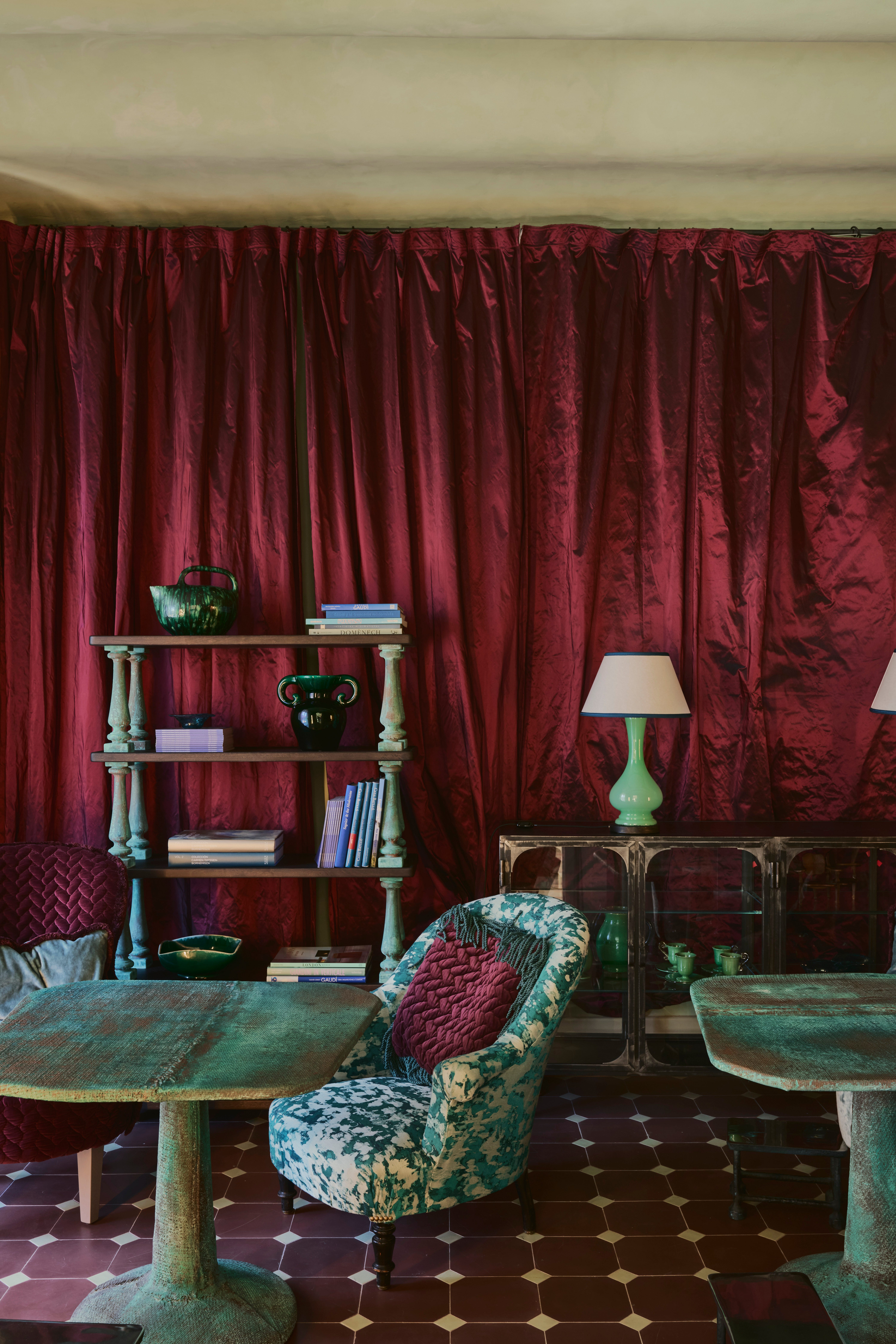 Gaudi interior with red curtains