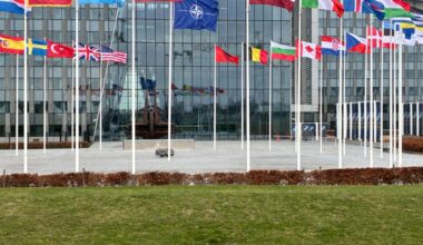 NATO headquarters in Brussels, Belgium, displays the flags of the alliance's 32 member states. Photo: Michael Nguyen/NurPhoto via AFP