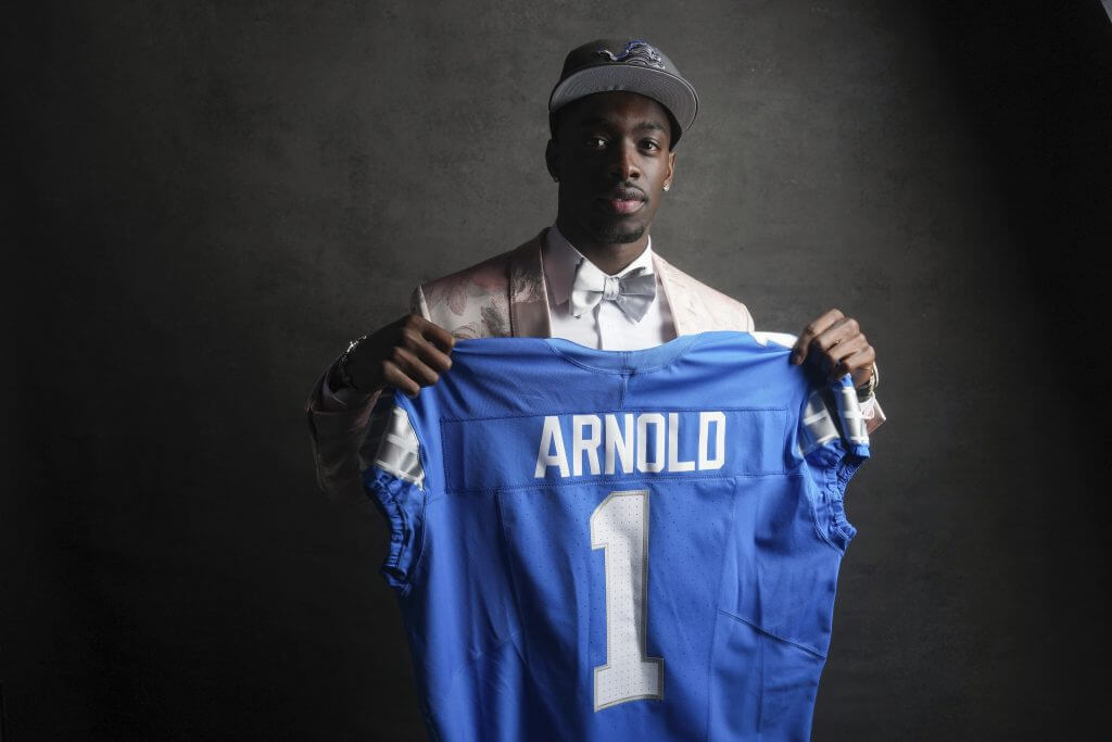 Terrion Arnold poses with a Detroit Lions jersey during the 2024 NFL Draft.