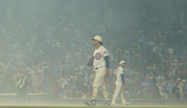 Cubs fans sing `Take Me Home, Country Roads’ during fog delay at Wrigley Field