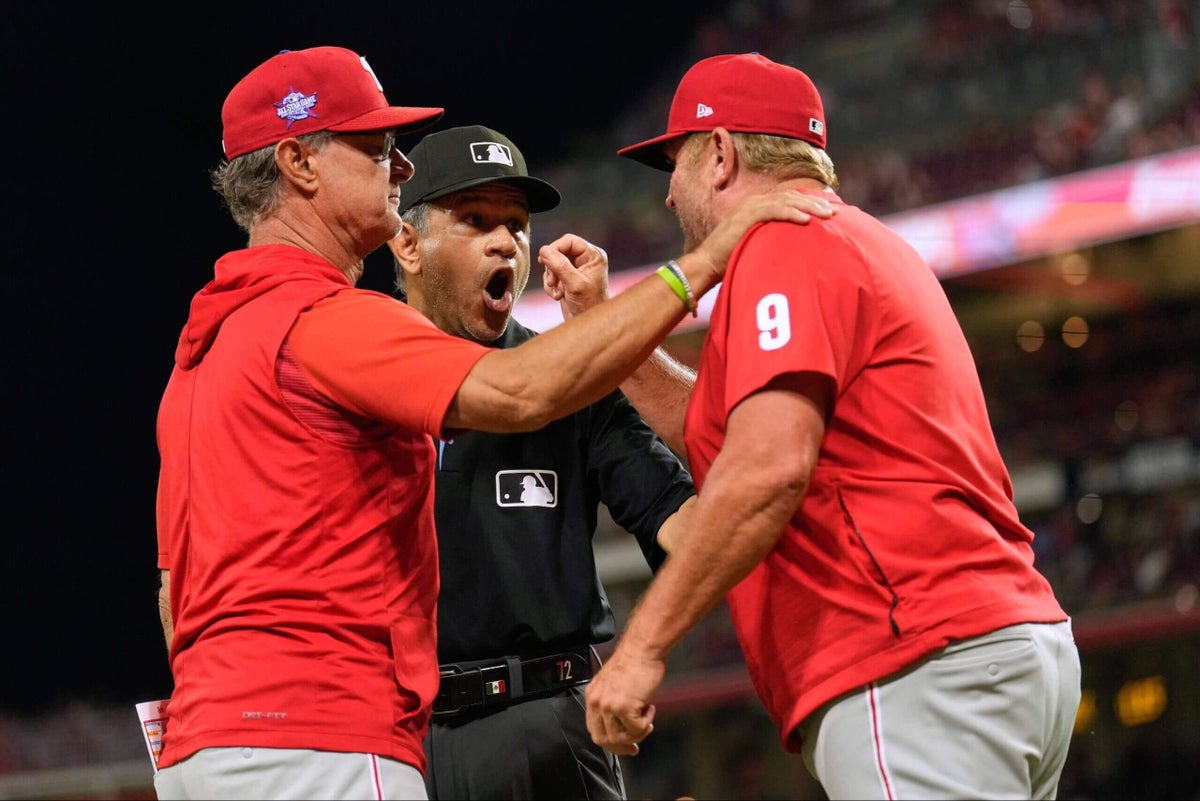 Two Phillies coaches tossed after Reds’ Elly De La Cruz called safe at second base