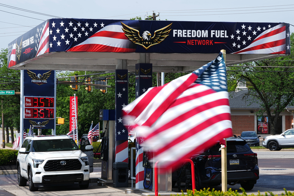 A flag flies at Freedom Fuel Network gas station in Dresher, Pa., Friday, July 10, 2026. (AP Photo/Matt Rourke)