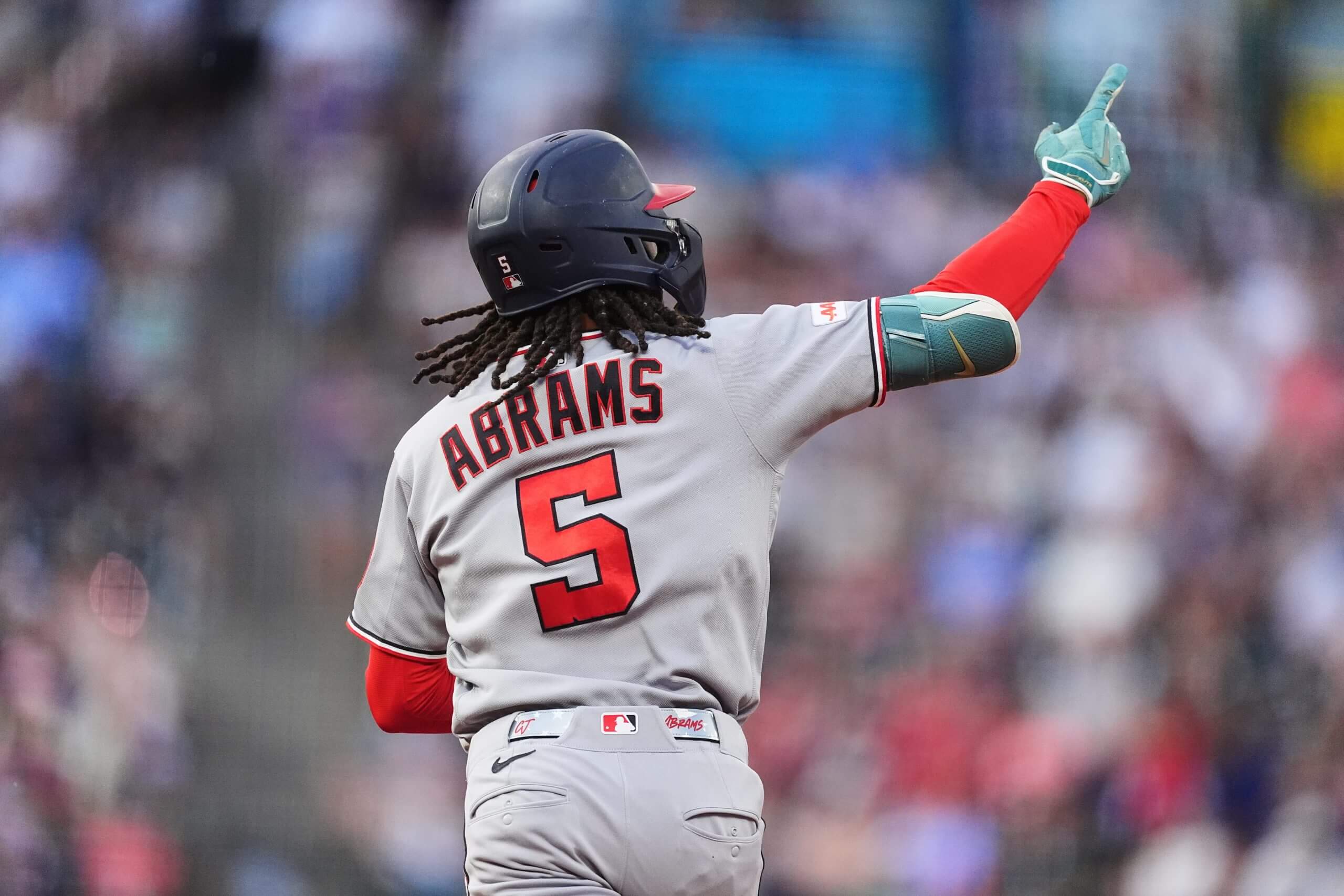 Washington Nationals' CJ Abrams celebrates a home run.