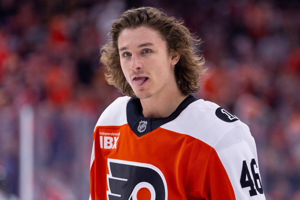 Philadelphia Flyers center Trevor Zegras looks on.