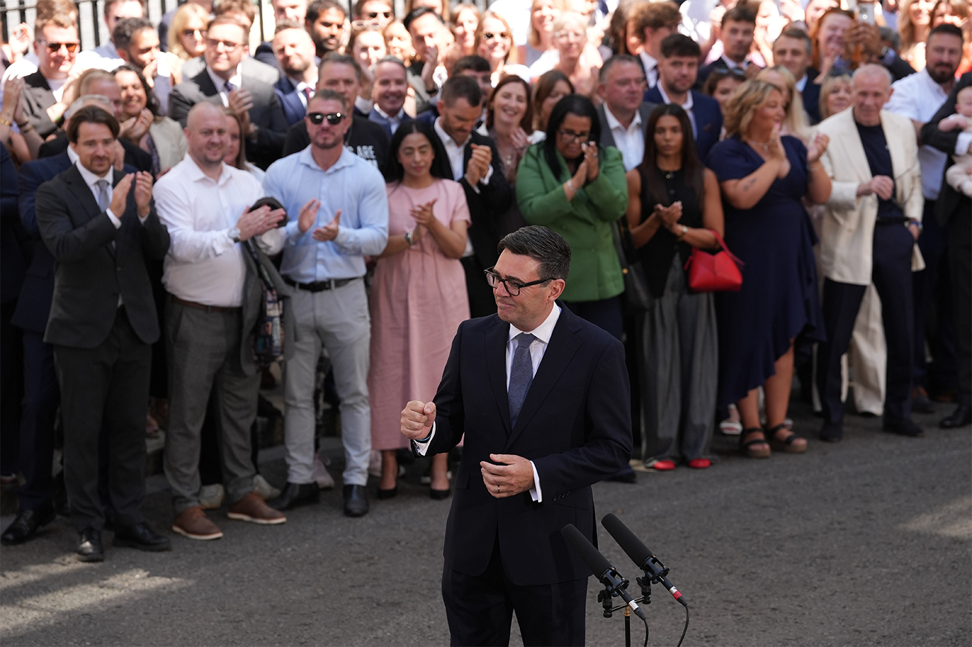 Andy Burnham makes a speech in front of a crowd outside 10 Downing Street, London.