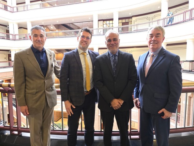 State Sen. Saud Anwar meets recently with new leadership at Trinity Health of New England and Saint Francis Hospital including Dr. Steven Hanks and Dr. Robert Roose.