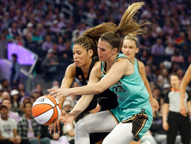Golden State Valkyries' Veronica Burton (22) and New York Liberty's Sabrina Ionescu (20) fight for the ball in the first quarter at the Chase Center in San Francisco, Calif., on Sunday, June 28, 2026. (Nhat V. Meyer/Bay Area News Group)