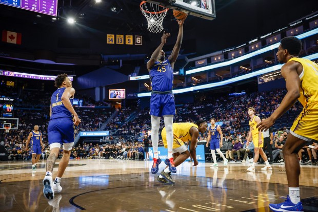 Golden State Warriors' Graham Ike (45) takes a shot against Los Angeles Lakers' Adou Thiero (1) during a Summer League game at Chase Center in San Francisco, Calif., on Friday, July 3, 2026. (Shae Hammond/Bay Area News Group)