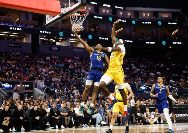 Golden State Warriors' LJ Cryer (18) takes a shot against Los Angeles Lakers' Arthur Kaluma (47) in the first quarter during a Summer League game at Chase Center in San Francisco, Calif., on Friday, July 3, 2026. (Shae Hammond/Bay Area News Group)