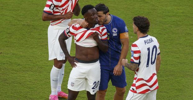 Bosnia and Herzegovina's Sead Kolasinac (5) talks to United States' Folarin Balogun (20) after Balogun received a red card in the second half for the FIFA World Cup at Levi's Stadium in Santa Clara, Calif., on Wednesday, July 1, 2026. (Nhat V. Meyer/Bay Area News Group)