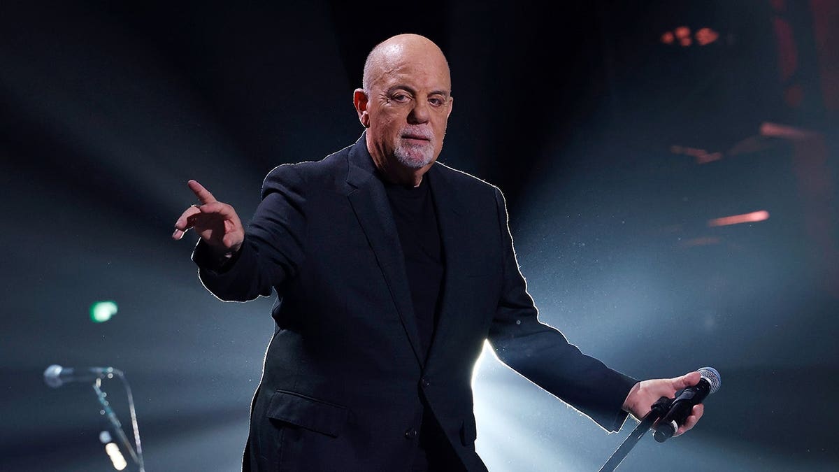 Billy Joel performs onstage at Tokyo Dome.