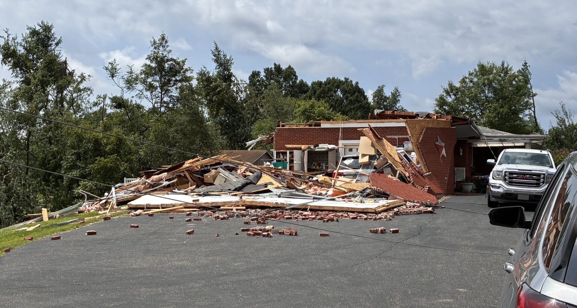 Tornado touchdowns blamed for damage on each side of the state